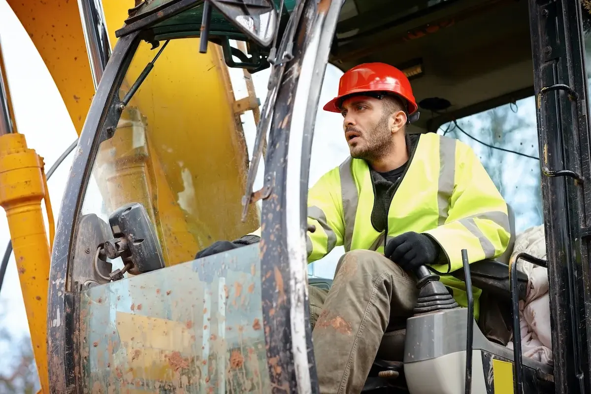 man operating a tractor